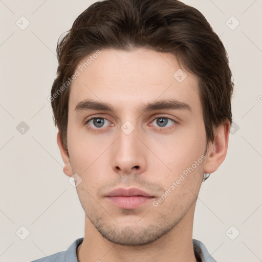 Neutral white young-adult male with short  brown hair and grey eyes