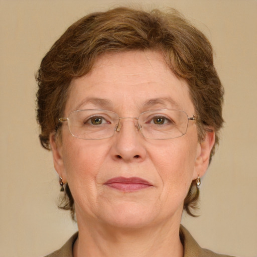 Joyful white middle-aged female with medium  brown hair and green eyes