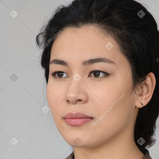 Neutral asian young-adult female with medium  brown hair and brown eyes