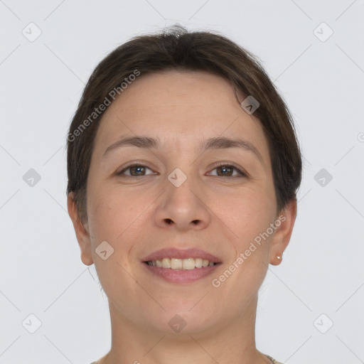 Joyful white young-adult female with short  brown hair and grey eyes