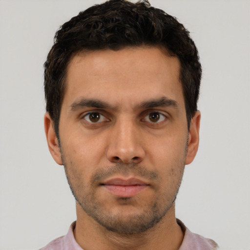 Neutral latino young-adult male with short  brown hair and brown eyes