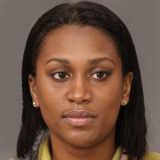 Neutral black young-adult female with long  brown hair and brown eyes