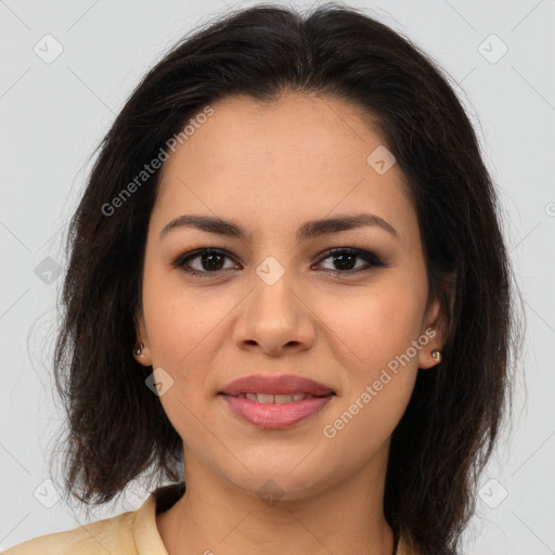 Joyful asian young-adult female with long  brown hair and brown eyes