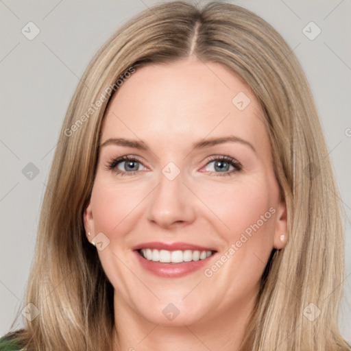 Joyful white young-adult female with long  brown hair and green eyes