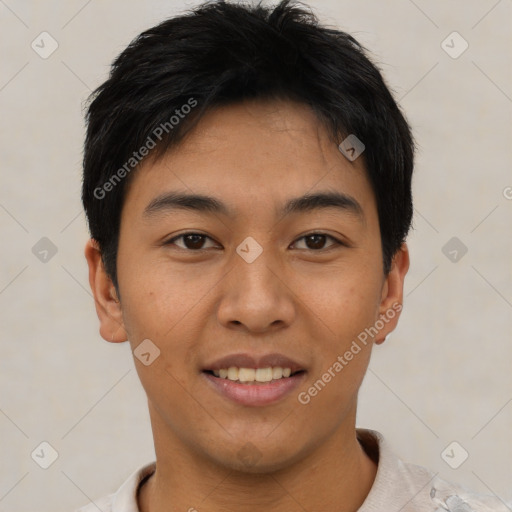 Joyful asian young-adult male with short  brown hair and brown eyes