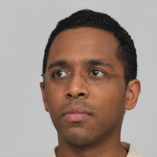 Neutral black young-adult male with short  black hair and brown eyes