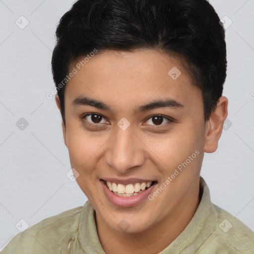Joyful latino young-adult male with short  brown hair and brown eyes