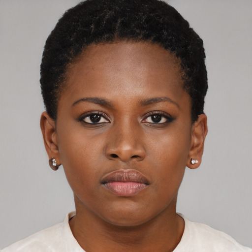 Neutral black young-adult female with short  brown hair and brown eyes