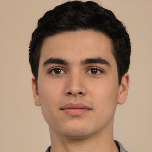 Neutral white young-adult male with short  black hair and brown eyes