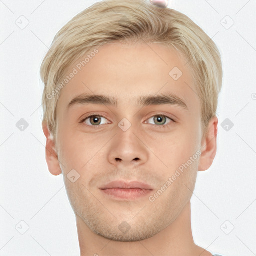 Joyful white young-adult male with short  brown hair and blue eyes