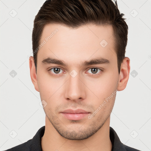 Neutral white young-adult male with short  brown hair and brown eyes