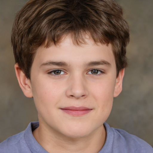 Joyful white child male with short  brown hair and brown eyes