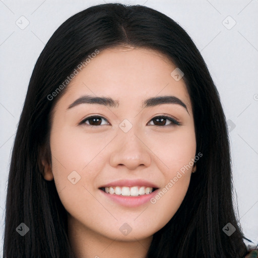 Joyful white young-adult female with long  black hair and brown eyes