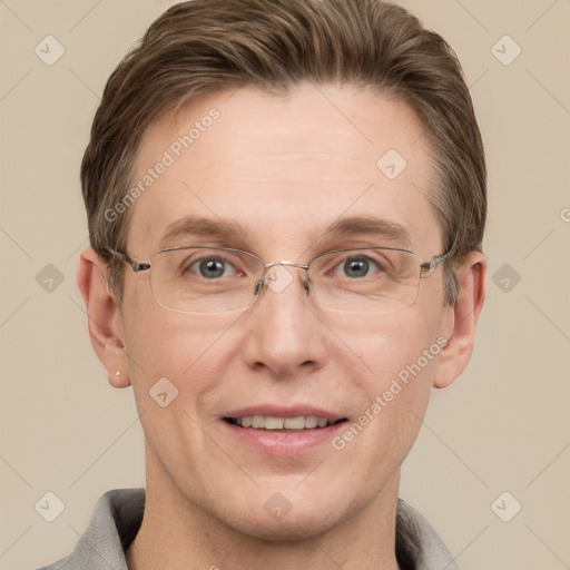 Joyful white adult male with short  brown hair and grey eyes