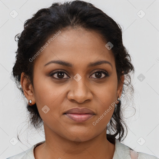 Joyful black young-adult female with medium  brown hair and brown eyes