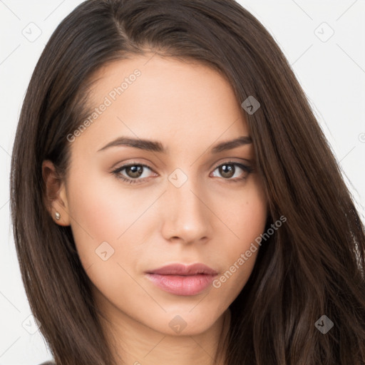 Neutral white young-adult female with long  brown hair and brown eyes