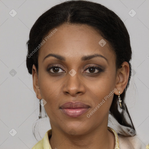 Joyful black young-adult female with medium  brown hair and brown eyes