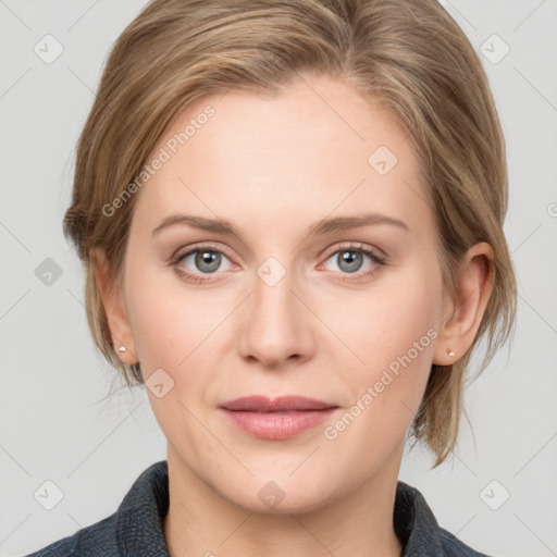 Joyful white young-adult female with medium  brown hair and blue eyes