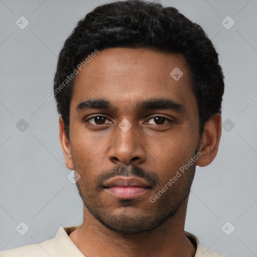 Neutral black young-adult male with short  black hair and brown eyes