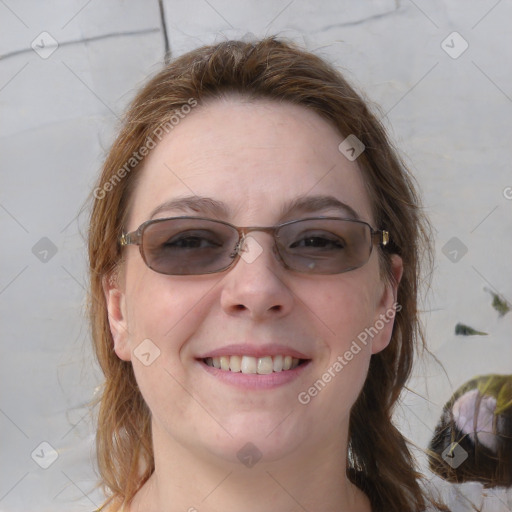 Joyful white young-adult female with medium  brown hair and blue eyes