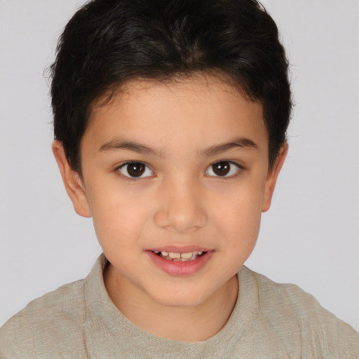 Joyful white child female with short  brown hair and brown eyes