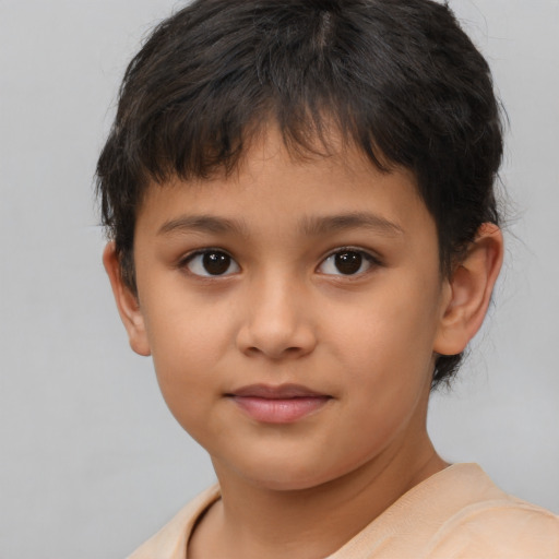 Joyful asian child female with short  brown hair and brown eyes