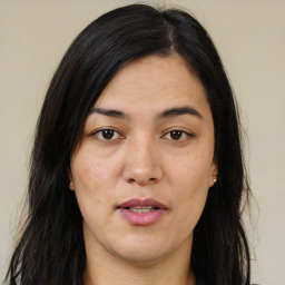 Joyful asian young-adult female with long  brown hair and brown eyes