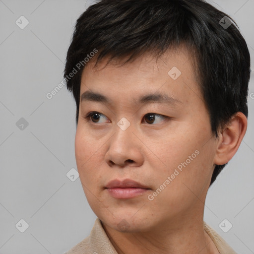 Neutral asian young-adult male with short  black hair and brown eyes