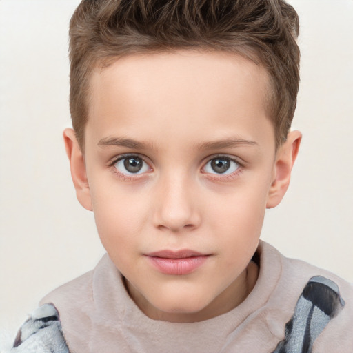 Joyful white child male with short  brown hair and brown eyes