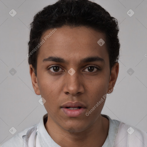 Neutral latino young-adult male with short  black hair and brown eyes