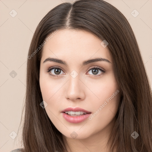 Neutral white young-adult female with long  brown hair and brown eyes