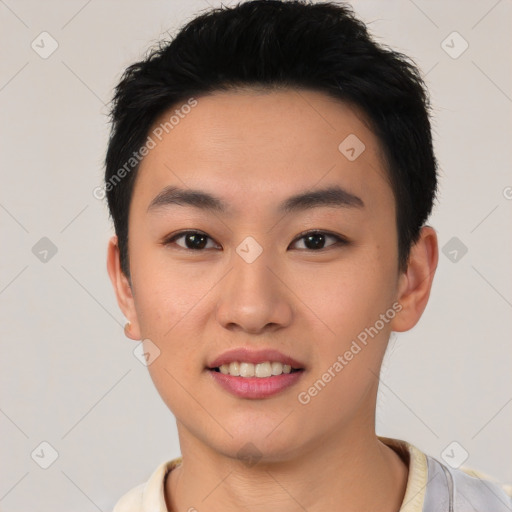 Joyful asian young-adult male with short  black hair and brown eyes