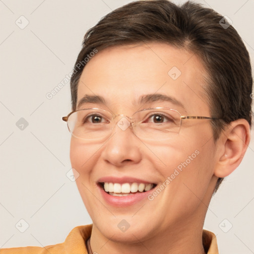 Joyful white adult female with short  brown hair and brown eyes