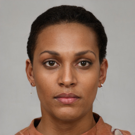 Neutral black young-adult female with short  brown hair and brown eyes