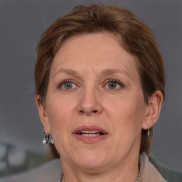 Joyful white adult female with short  brown hair and grey eyes