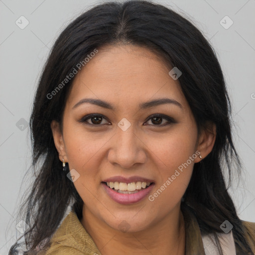 Joyful latino young-adult female with long  brown hair and brown eyes