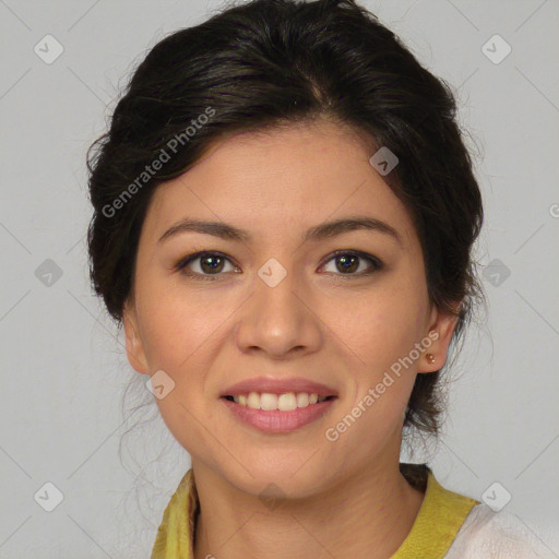 Joyful latino young-adult female with medium  brown hair and brown eyes