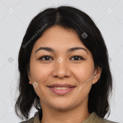 Joyful latino young-adult female with medium  black hair and brown eyes