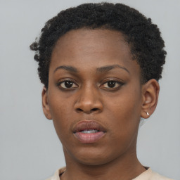 Neutral black young-adult female with short  brown hair and brown eyes