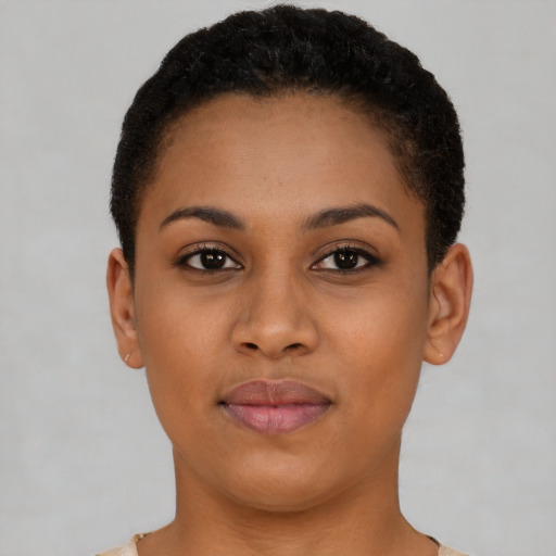 Joyful black young-adult female with short  brown hair and brown eyes