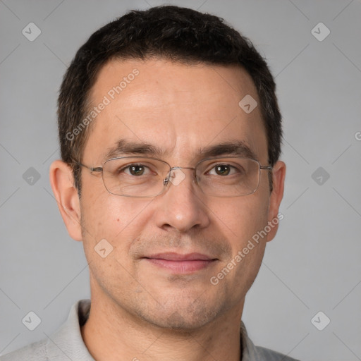 Joyful white adult male with short  brown hair and brown eyes