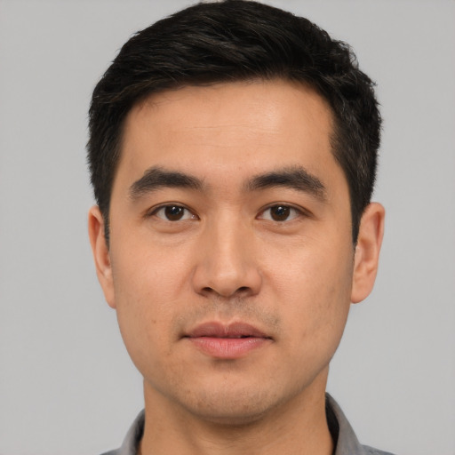 Neutral asian young-adult male with short  black hair and brown eyes