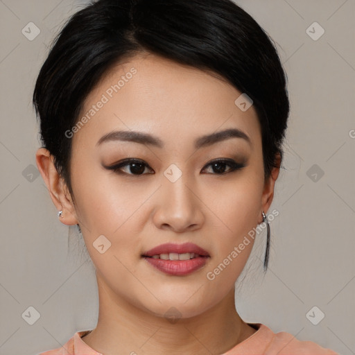 Joyful asian young-adult female with medium  black hair and brown eyes