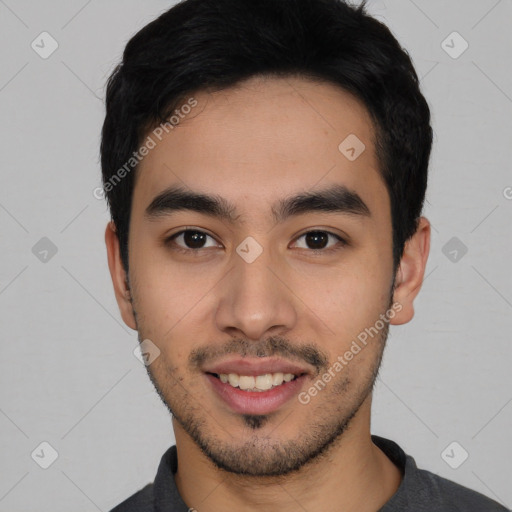 Joyful latino young-adult male with short  black hair and brown eyes