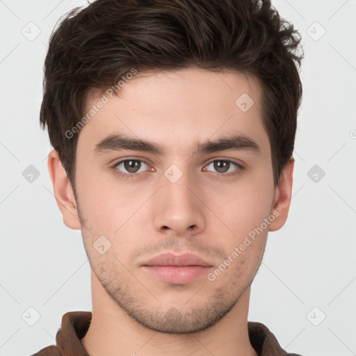 Neutral white young-adult male with short  brown hair and brown eyes