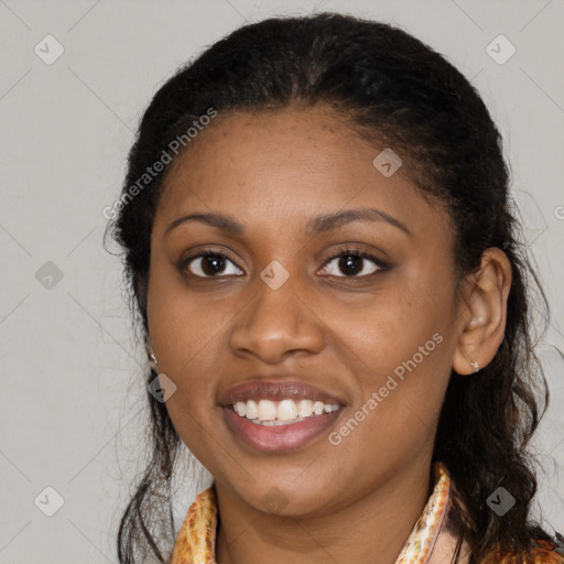 Joyful black young-adult female with medium  brown hair and brown eyes