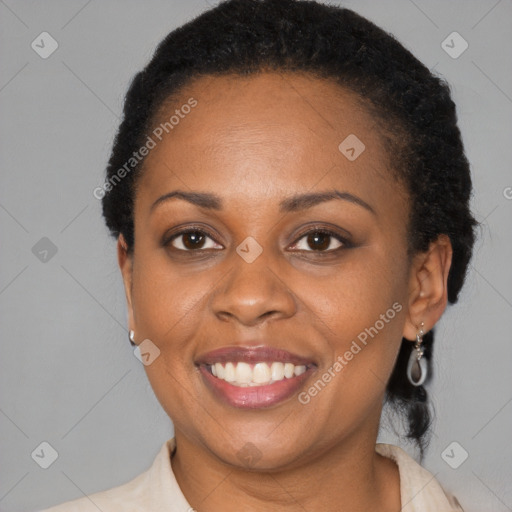 Joyful black young-adult female with medium  black hair and brown eyes