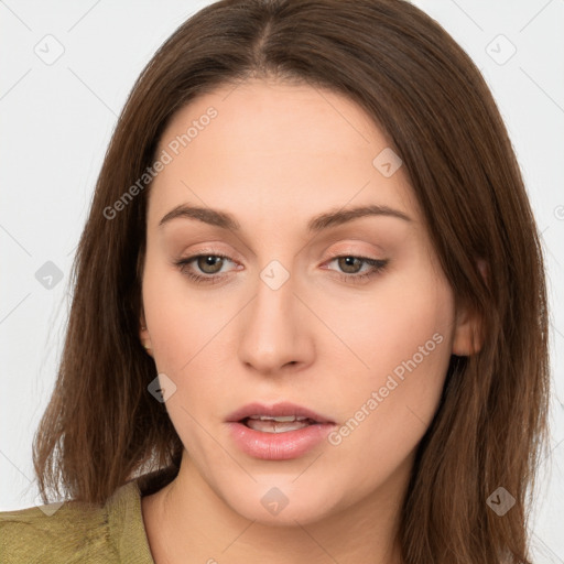 Neutral white young-adult female with long  brown hair and brown eyes