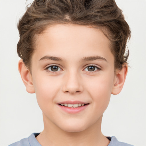 Joyful white child female with short  brown hair and brown eyes