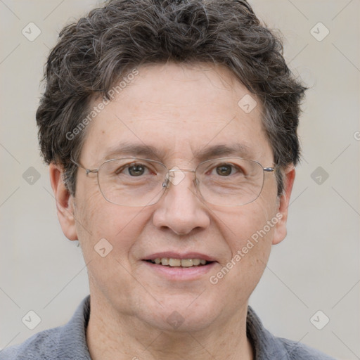 Joyful white adult male with short  brown hair and grey eyes